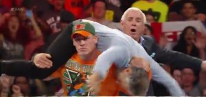 John Cena lifts Jon Stewart for an AA